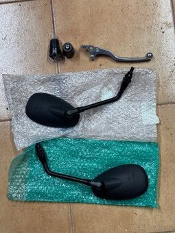 Originální zrcátka, závaží do řidítek a páčka přední brzdy