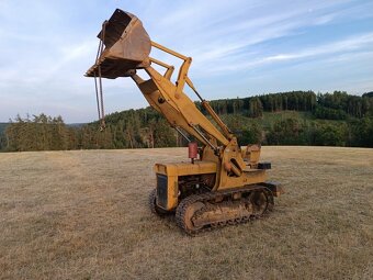 Pásový nakladač Massey Ferguson MF 244