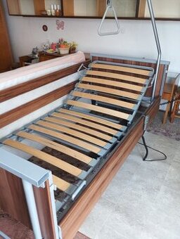 Elektrická polohovací postel + hrazda + matrace + potah