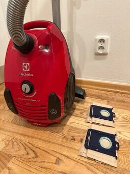 Červený vysavač