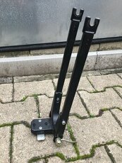 Držák předního kola na střešní příčníky.