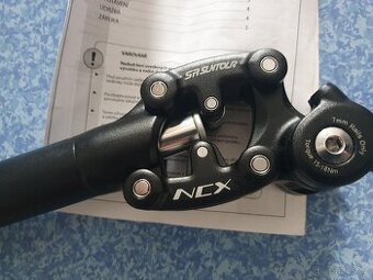 Suntour NCX - odpružená sedlovka - 1