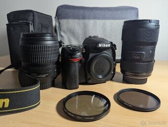 Zrcadlovka Nikon D7000, 2 objektivy a filtry brašna