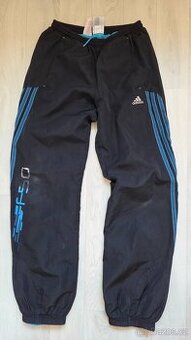 Šusťákové kalhoty Adidas vel.152