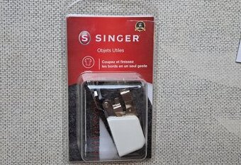 Lemovací patka s ořezem Singer 250025803.06