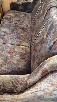 Rozkládací pohovka.