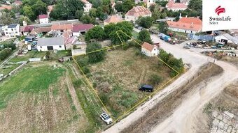 Prodej stavebního pozemku 1858 m2, Hostim - 1