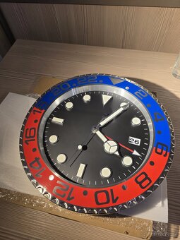 Nástěnné hodiny Rolex (Red-blue)