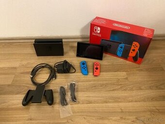 Nintendo Switch console with neon blue&red Joy-Con