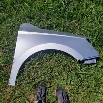 Fabia 3 III pravý předni blatnik