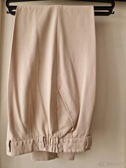 Nové dámské béž. kalhoty zn. Biaginni, vel 38