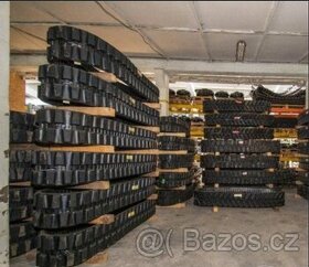 pásy a pneumatiky pro stavební a zemědělské stroje