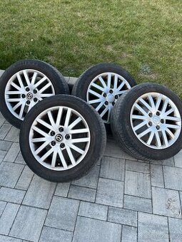 Alu kola Mazda 7j x 16 pneu 205/55/16