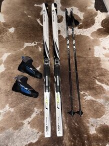 Nové Běžky Tecno Pro 130 cm,hůlky 105 cm,boty vel.34 NNN