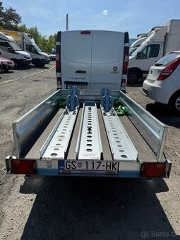 Půjčovna - přívěsný vozík na přepravu motorek