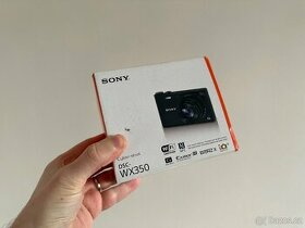 Sony Cyber Shot DSC WX350 - poškozený objektiv