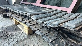 ocelové pásy s gumovými bačkorami Takeuchi TB250