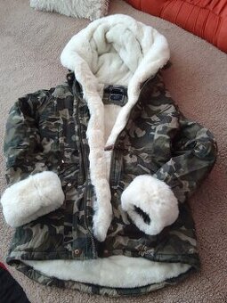 Dámská kožešinová bunda.