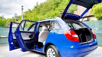 Velice zachovalá málo  jetá Škoda Fabia II 1.2 kombi .
