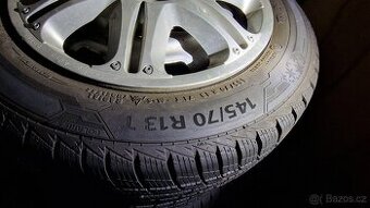 Zimní Barum 145/70 R13 s disky a poklicemi