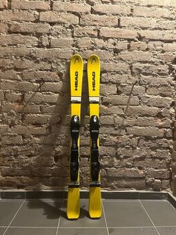 Žluté sjezdové lyže HEAD 117