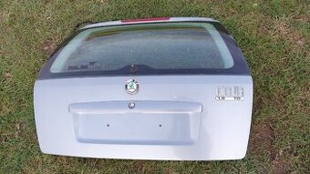 ŠKODA OCTAVIA 1 – DVEŘE KUFRU COMBI ŠEDÁ