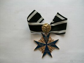 Medaile za zásluhy.