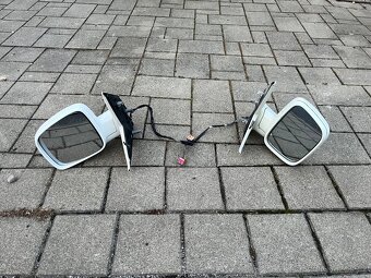 VWT5 zadni světla,držáky narazniku, el. zrcatka