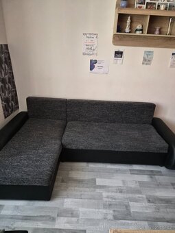 Zánovní rozkládací sedačka s úložným prostorem