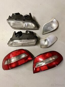 Volvo C70 světla Hella přední + zadní + blinkry