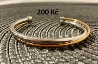 Různé stříbrné a pozlacené šperky a bižuterie