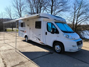 Obytné auto Carado T348 2.3JTD,klima,solar,spouštěcí postel