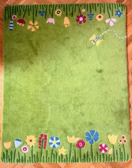 Vlněný barevný koberec s květinovým vzorem do pokojíčku