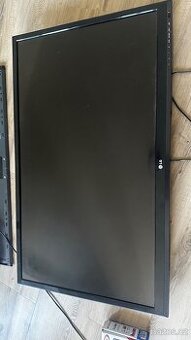 TV LG 106cm + držák na zeď + setobox.