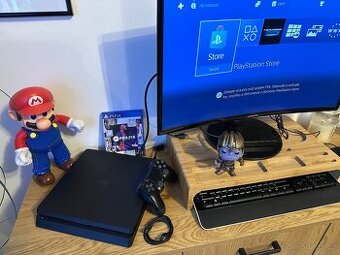 Playstation 4 Slim + hry