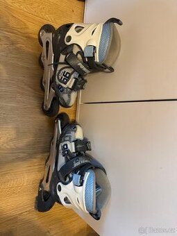 Dětské rostoucí brusle s brzdou ( velikost 30 - 33 )