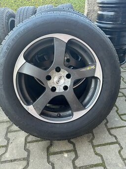 Alu kola Dotz Freeride + zimní pneu Dunlop