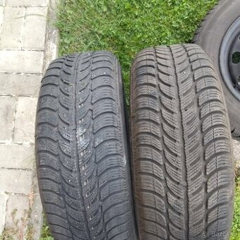 Sada 14" zimních pneu včetně plech. disků a poklic
