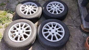 Letní alu kola Mitsubishi Carisma 195/60 r15
