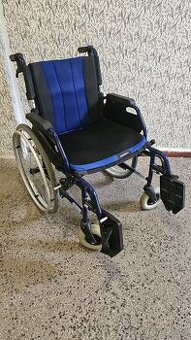 Invalidní vozík.