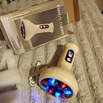 Masážní přstroj. - 1