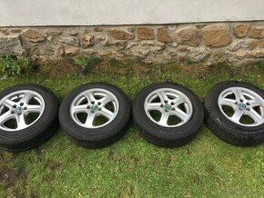 Použité alu disky včetně letních pneu - Škoda Oktavia