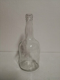 Starožitná sklenená fľaša značená