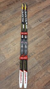Dětské nové běžky s vázáním Peltonen 138cm