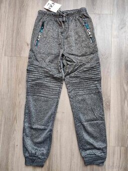 Softshellové zateplené tepláky nové