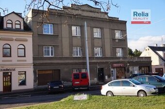 Prodej bytového domu s komerčními prostory a s garáží, Tepli