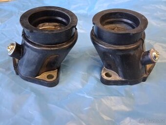 Příruby sání, hrdla karburátoru  čína
