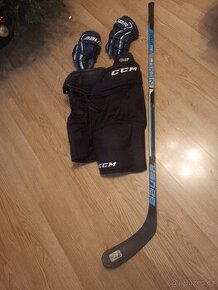 Juniorské hokejové kalhoty + hokejka