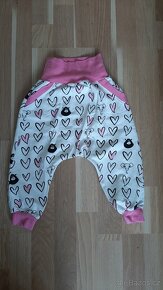 Dívčí teplaky vel. 92 zn.