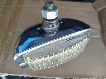 Chromovaná couvačka Hella na veterán